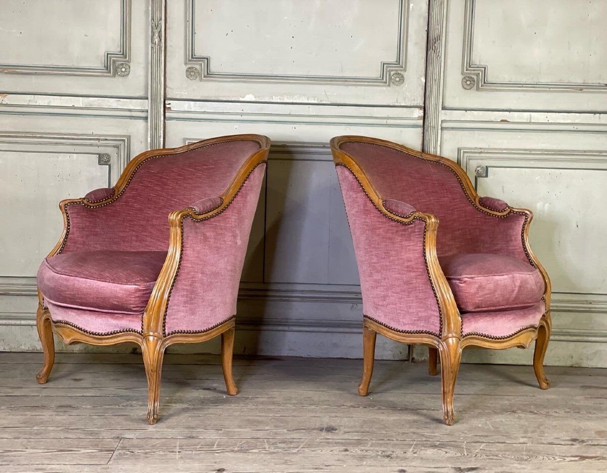 Pair of Louis XV style bergère armchairs in carved wood, pink velvet, circa 1900