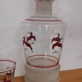 Glasses and carafe decorated with red Christmas reindeer and white granita 60's