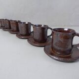 coffee service in iridescent stoneware cups and vintage sugar bowl