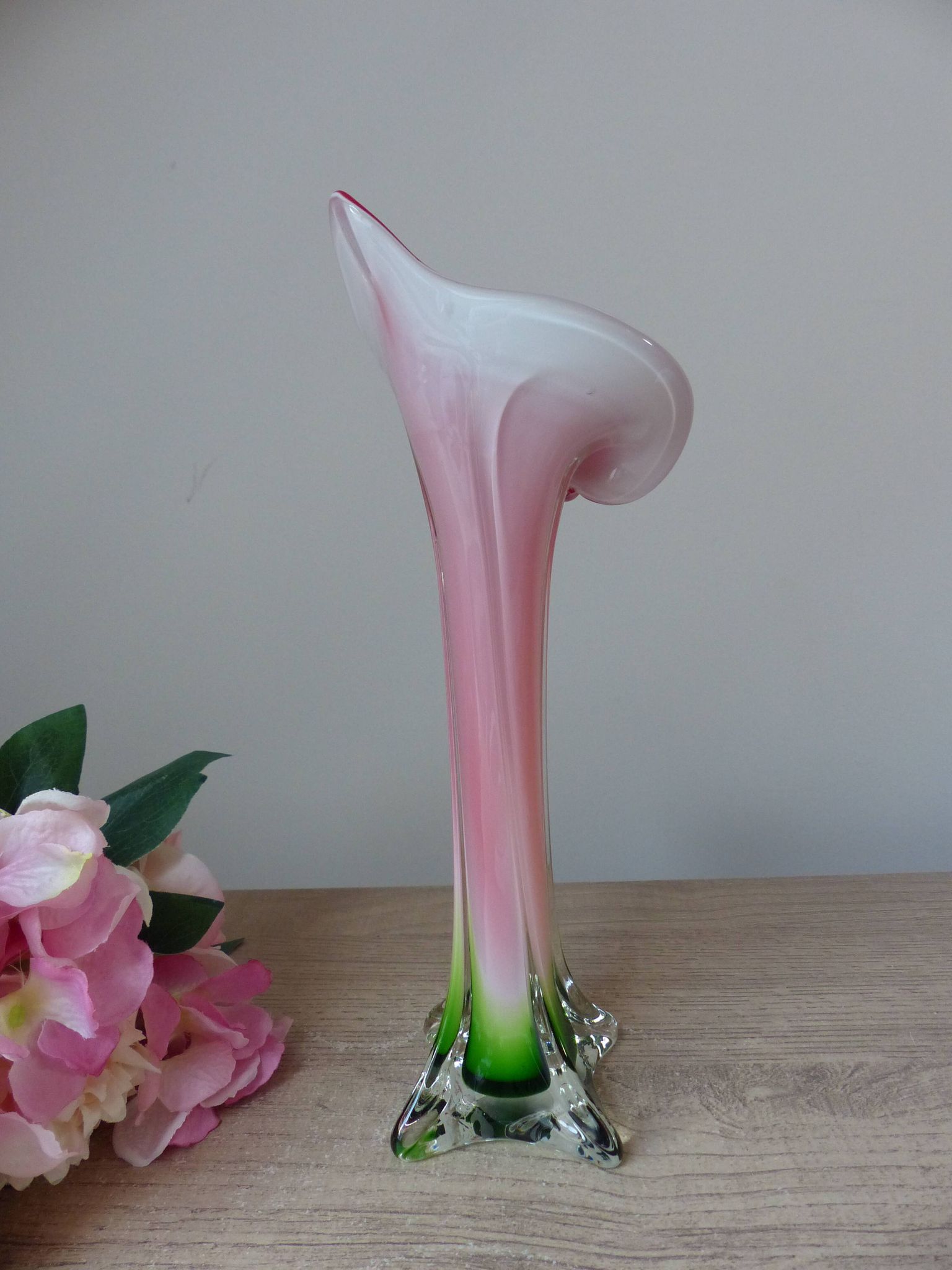 Vintage coloured blown glass vase in the shape of a calla lily.