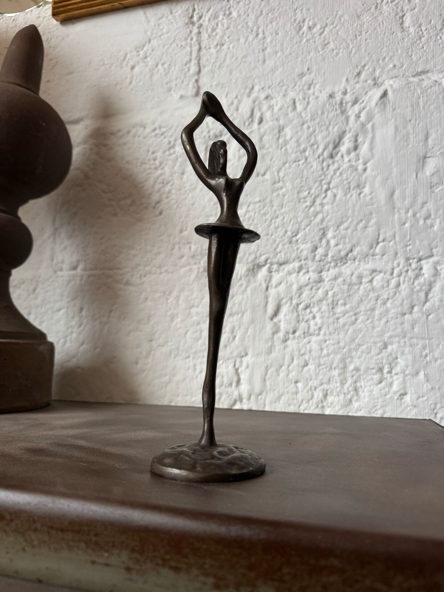 Small bronze dancer in 1980s modernist style.
