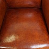 Fauteuil ancien en peau de mouton entièrement restauré