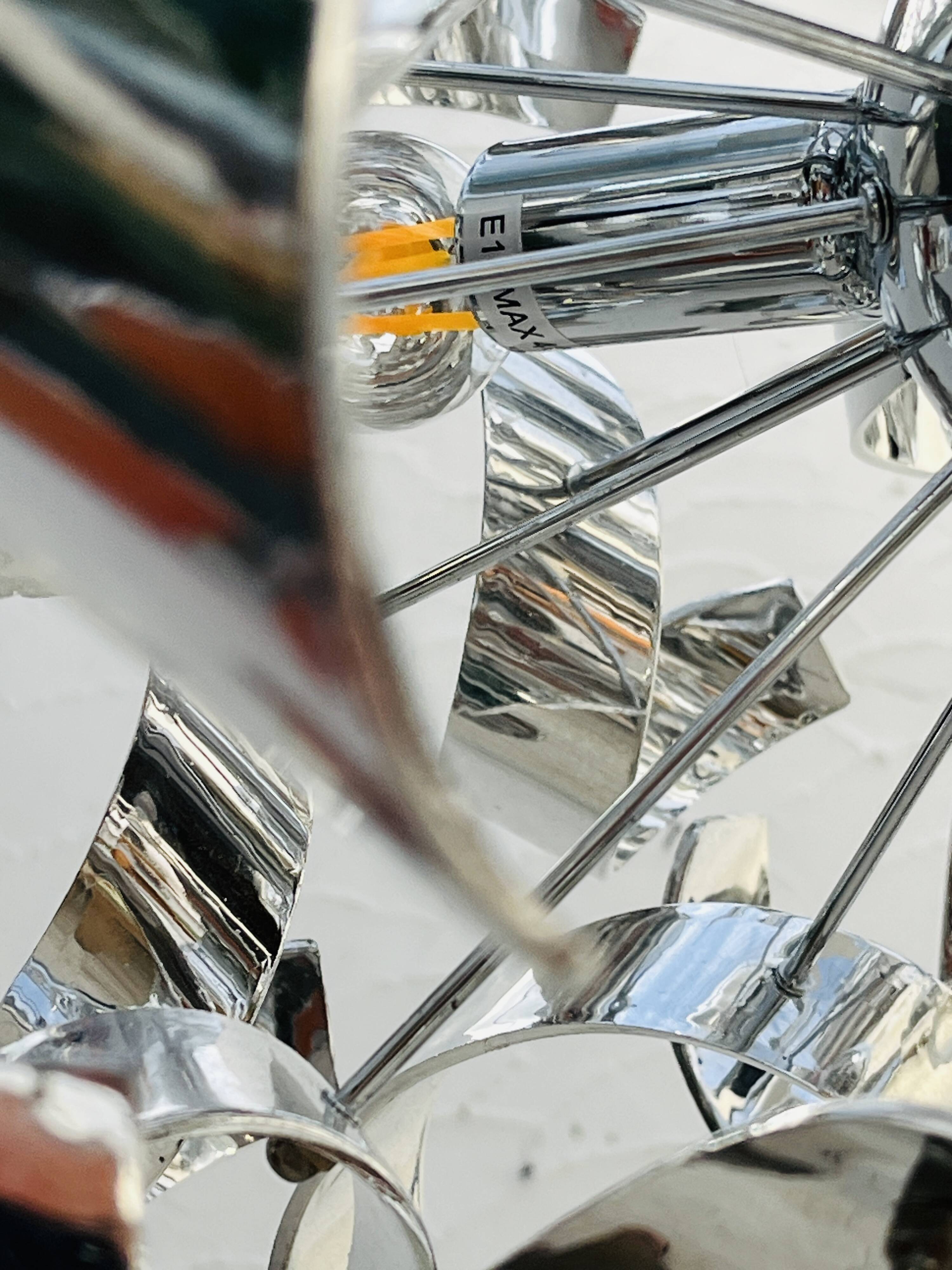 Sculptural chrome suspension design