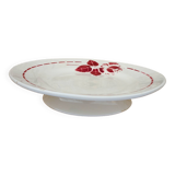 Old presentation plate on red rose foot