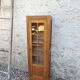 Showcase an old door, small bookshelf.