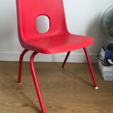 Red child chair by robin day for ikea