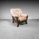 Fauteuil en tissu beige 70s vintage moderne