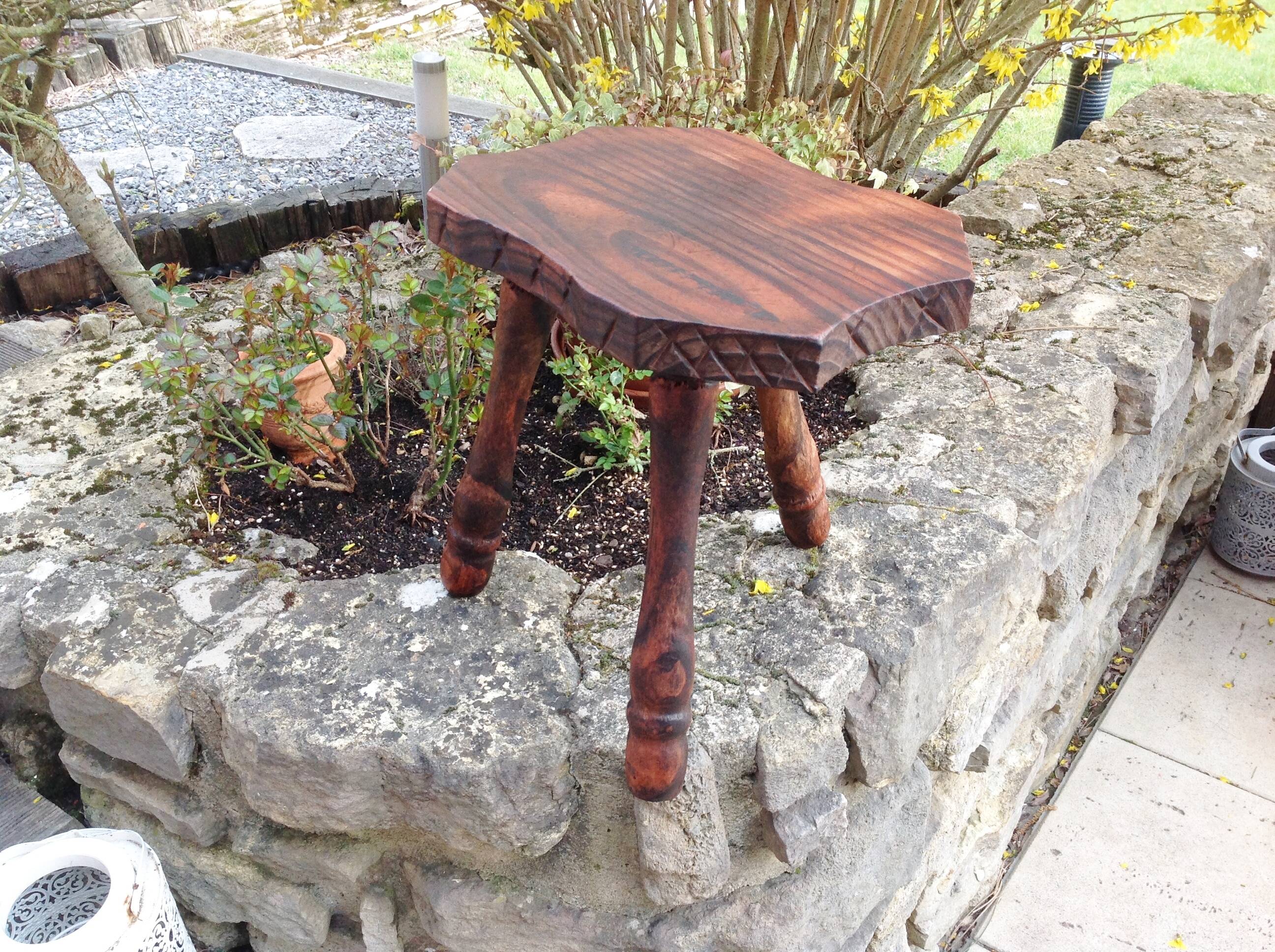 Vintage brutalist wooden tripod stool from the 60s and 70s
