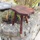 Vintage brutalist wooden tripod stool from the 60s and 70s