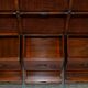 Pair of open bookshelves in crocodile leather with drawers and compartments.