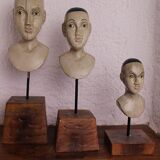 Trio of wooden busts