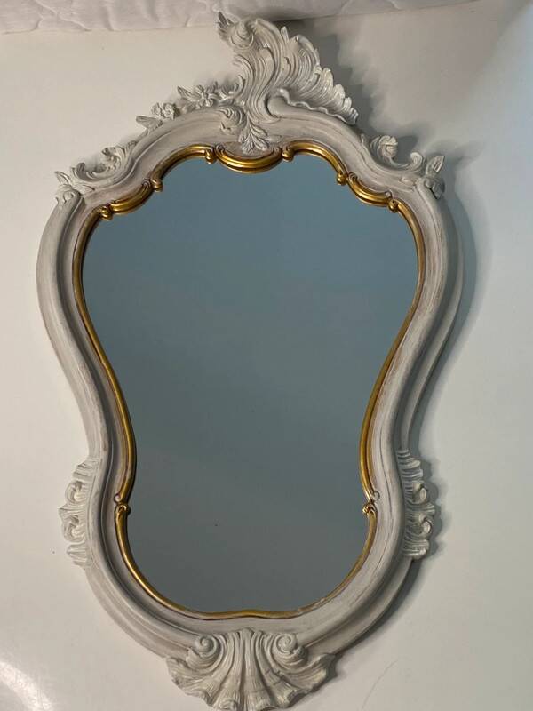 Magnificent patinated and gilded baroque style mirror