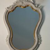 Magnificent patinated and gilded baroque style mirror