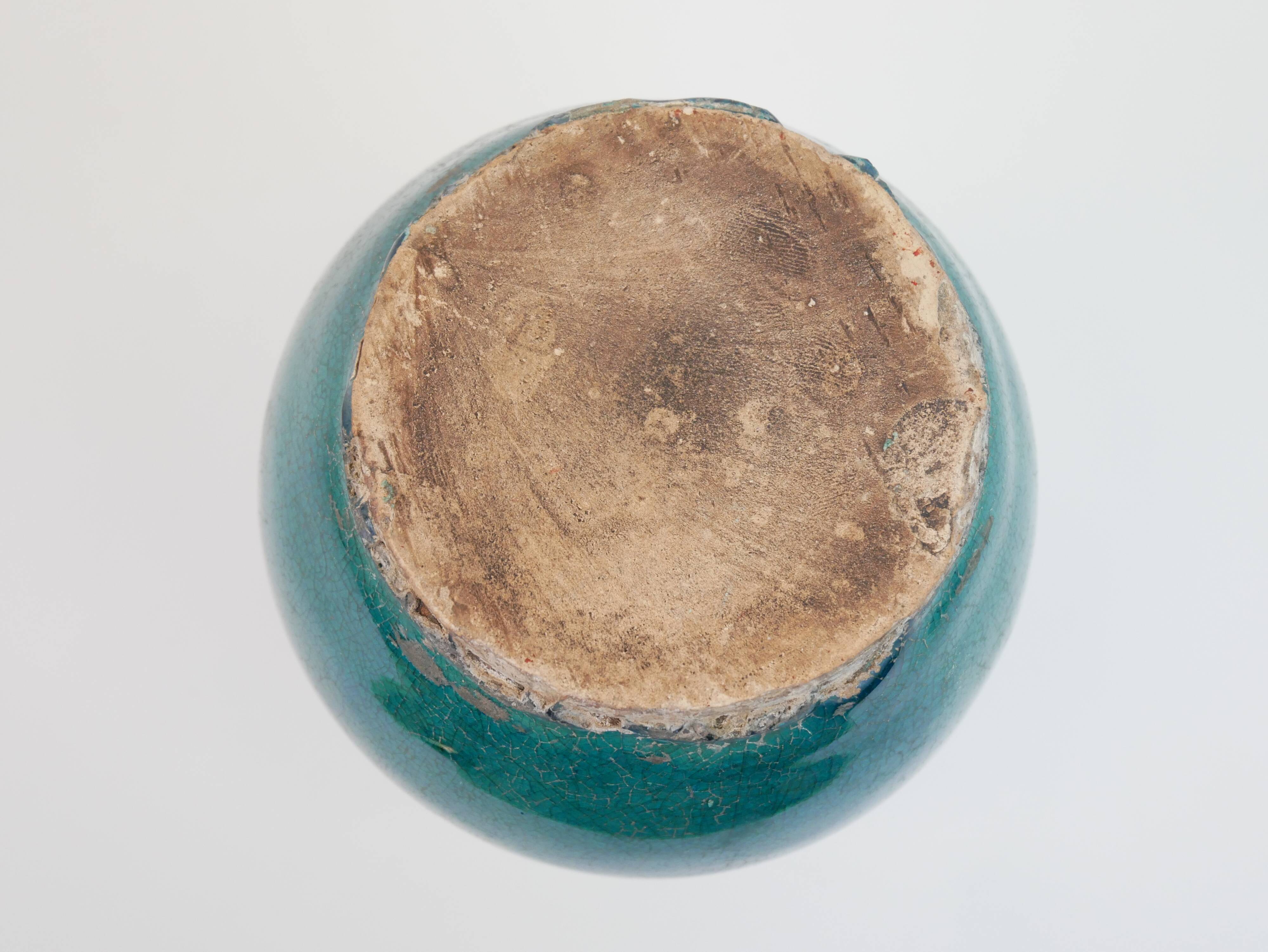 Small old blue ceramic vase