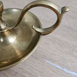 Hand candlestick with brass fitter