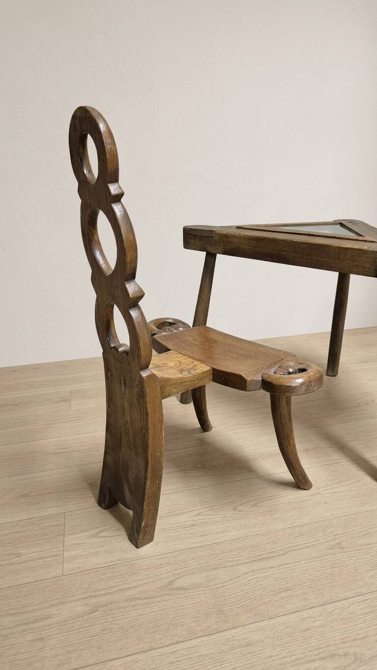 Vintage sculptural wooden table and two chairs, hand-carved loop backrests