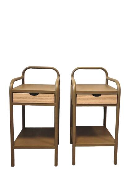 Old ochre metal bedside tables from a boarding school.