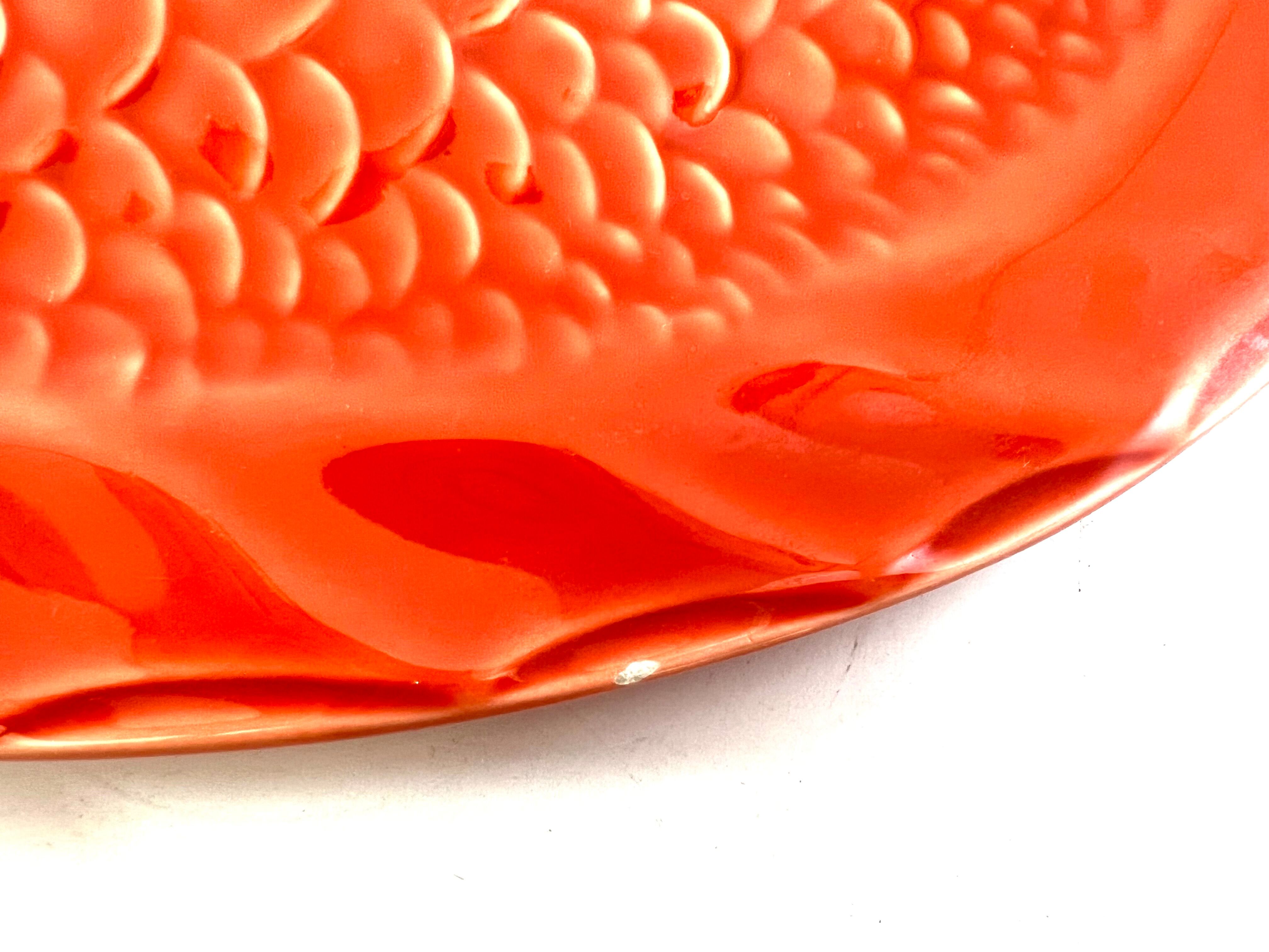 Orange fish dish Christian Dior