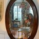Large antique oval mahogany mirror, mercury glass, 19th century