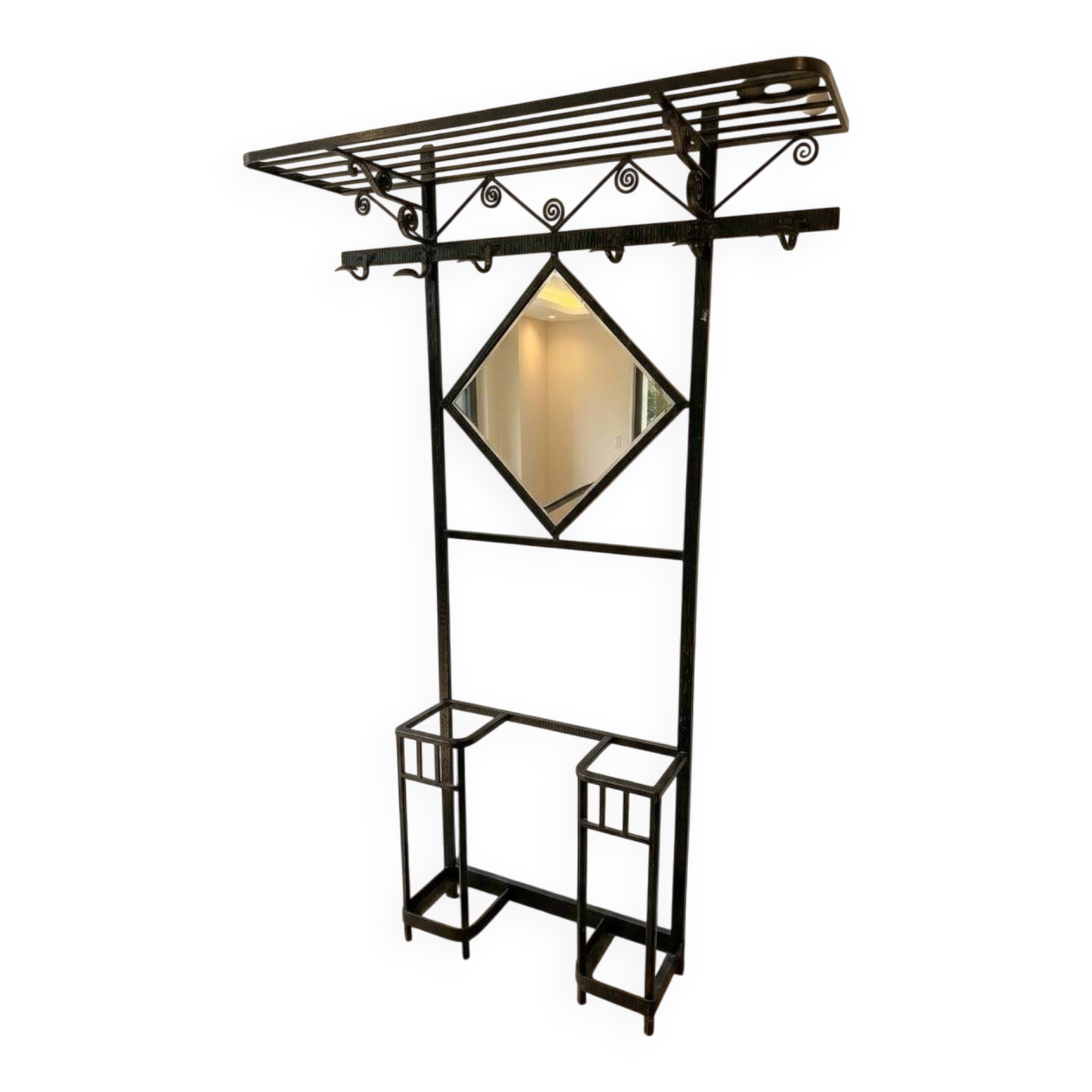 Antique black wrought iron coat rack with mirror.