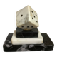A marble dice bookend
