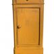 Yellow painted wooden bedside table