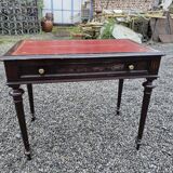 Bureau plat en acajou du XXe