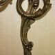 Pair of antique wall sconces from the 1920s in gilded bronze.