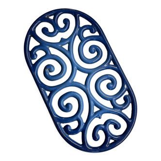 Old cast iron table mat