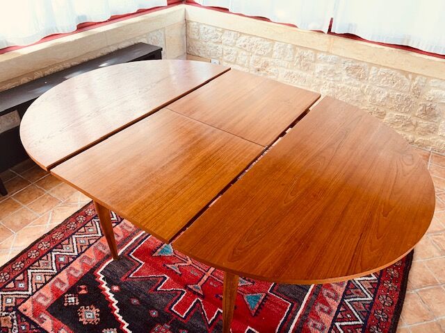 Expandable teak dining table, butterfly extension, circa 60s