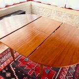 Expandable teak dining table, butterfly extension, circa 60s