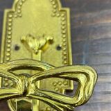 Brass coat hooks