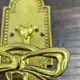 Brass coat hooks