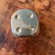 Pen holder, die-shaped brass paperweight