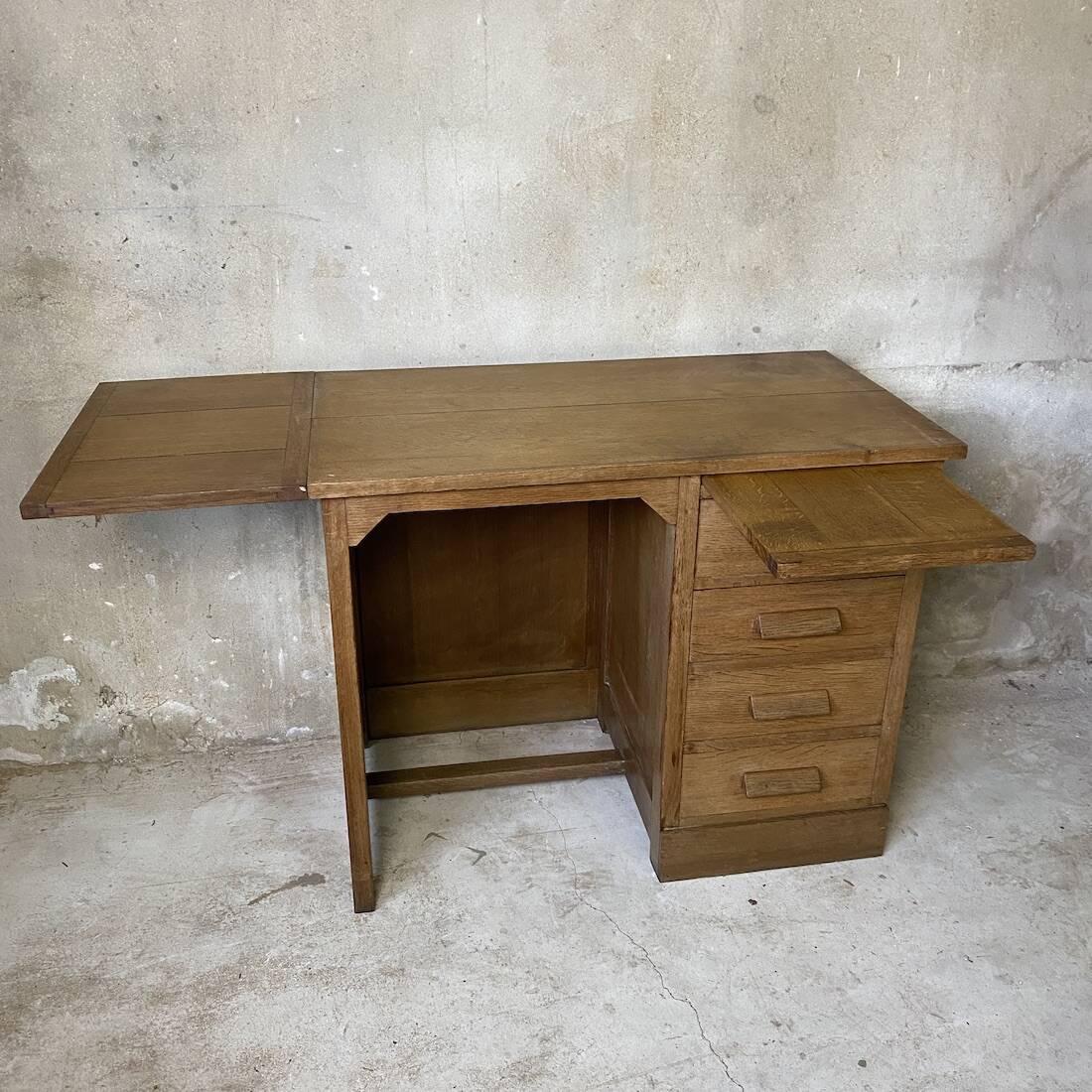 Vintage 1950s children's desk made of solid wood.