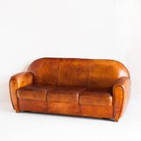 Vintage leather club sofa. Art Deco style. France, 1950s. (sofa convertible into bed)