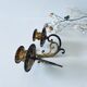 Old wall candle holder in golden brass