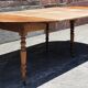 Extendable round table (with extensions and flaps), cherry wood.