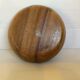 Round wooden pocket emptier
