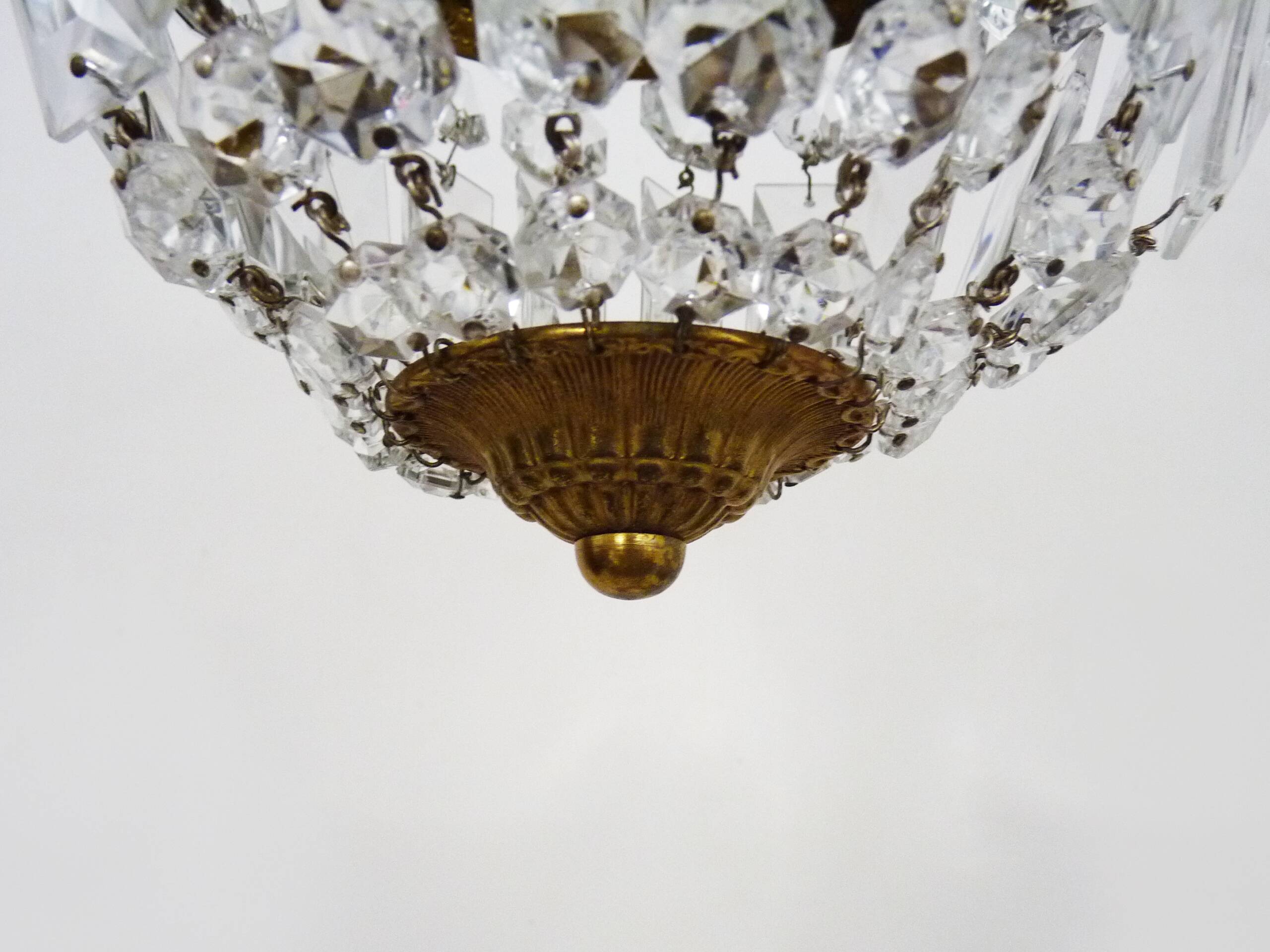 Old crown ceiling light with 2 bulbs, half basket with glass pendants.