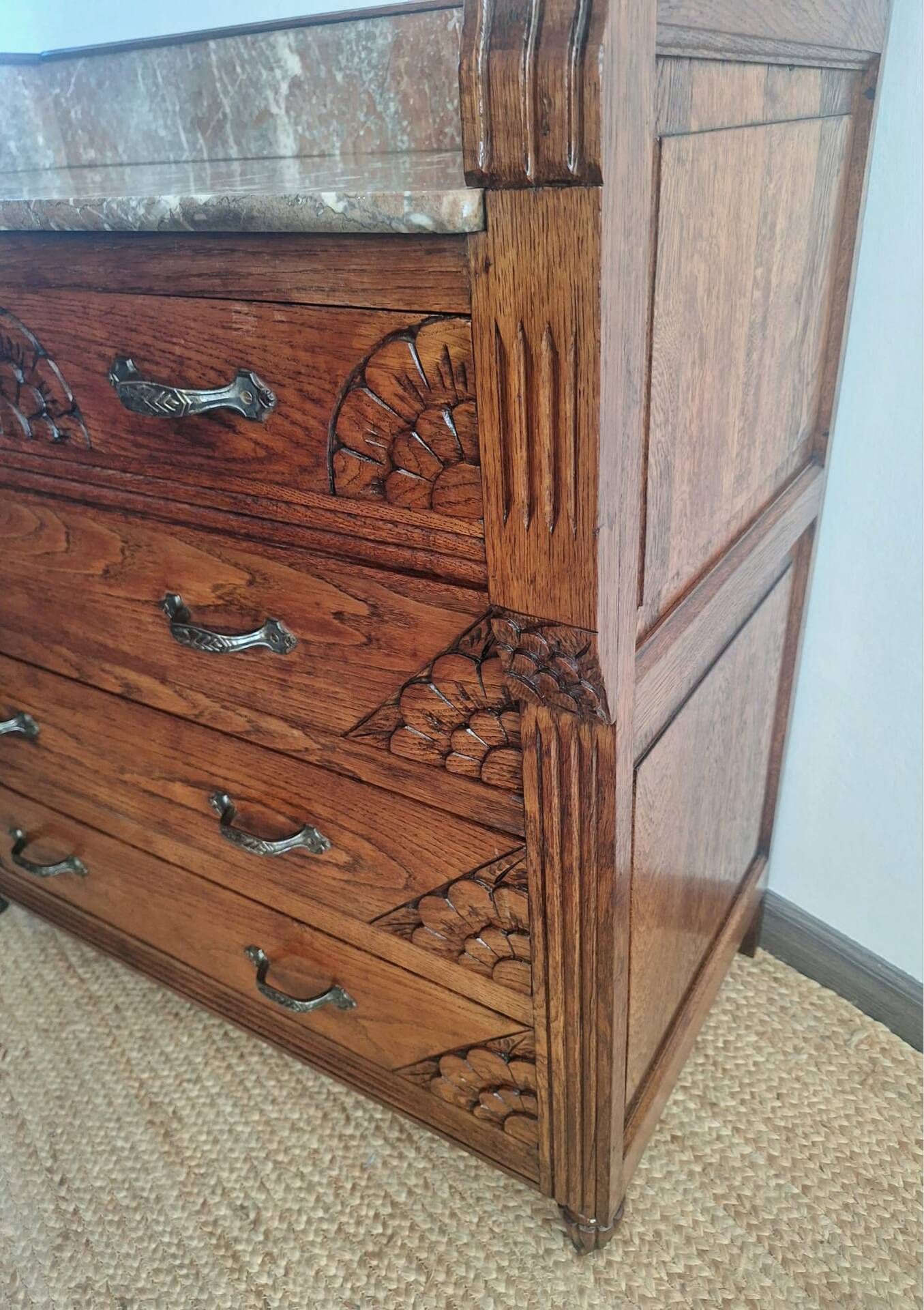 Art Deco commode with marble top, vintage antique furniture.