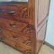 Art Deco commode with marble top, vintage antique furniture.