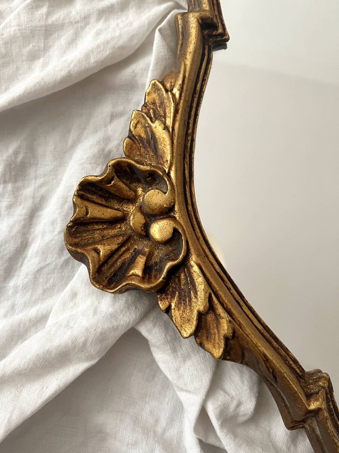 Antique Louis XV gilded mirror with vintage rocaille shell