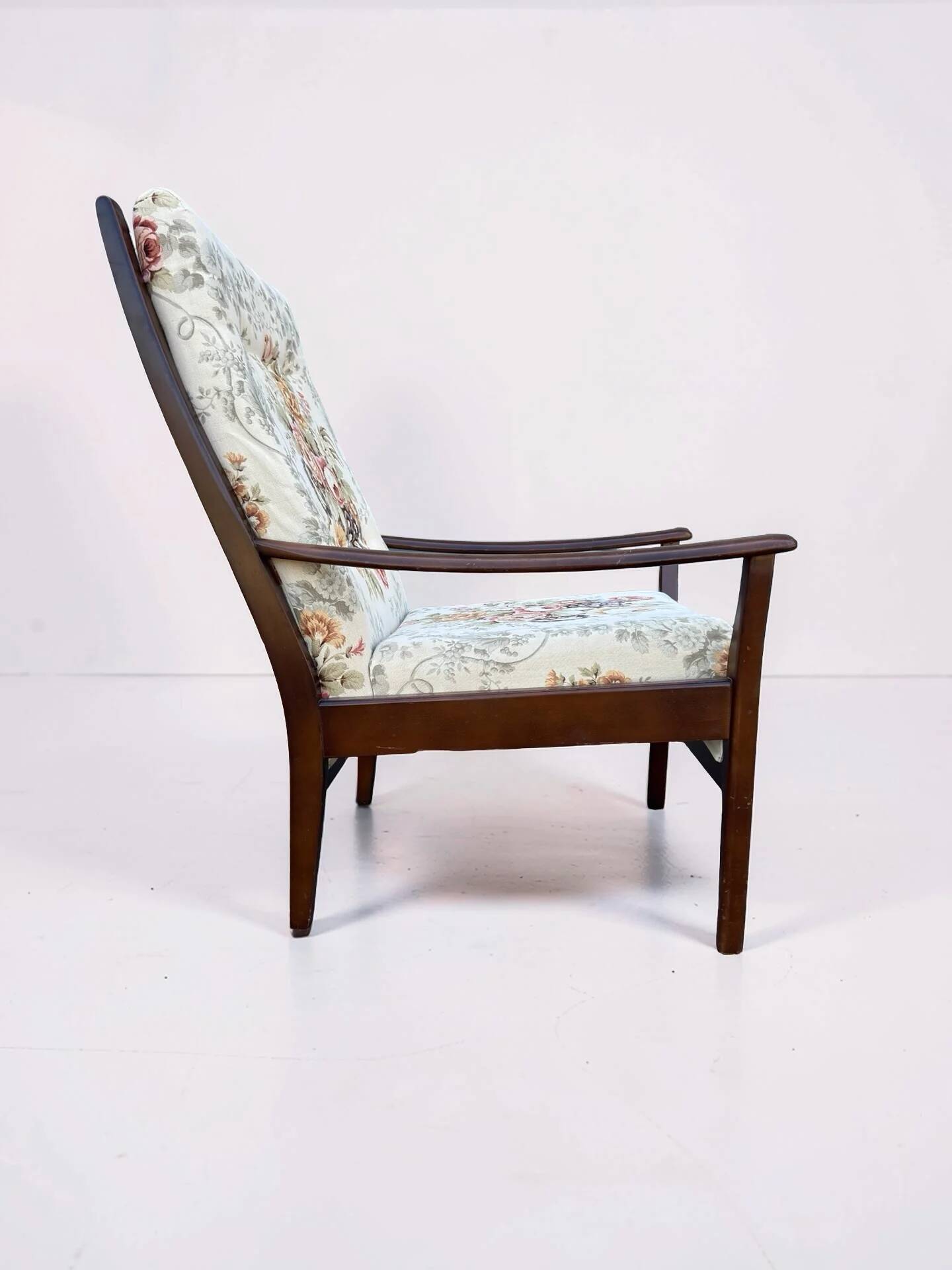 Vintage teak armchair with floral upholstery