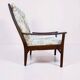 Vintage teak armchair with floral upholstery