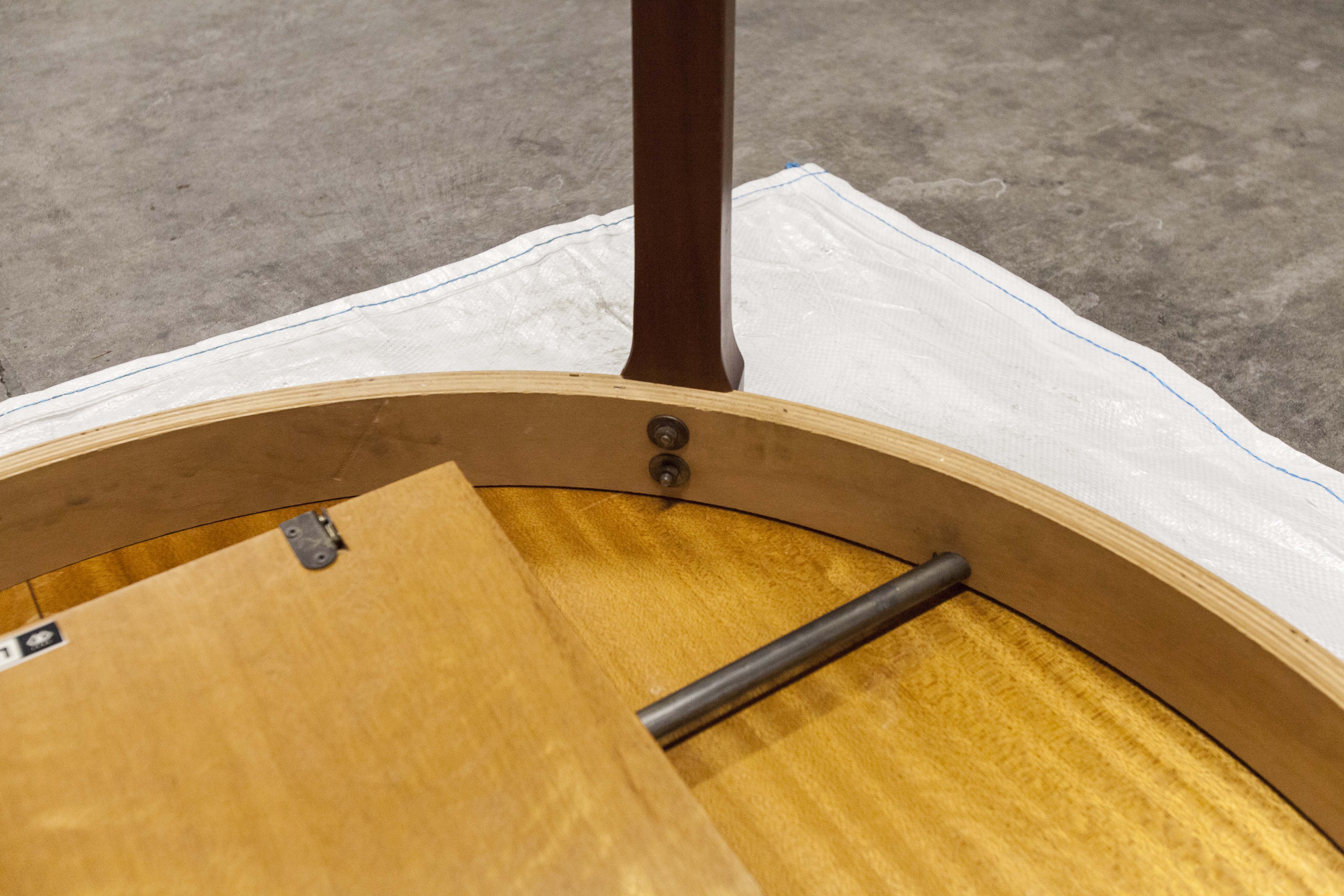 Scandinavian table in round teak with built-in extensions 1960