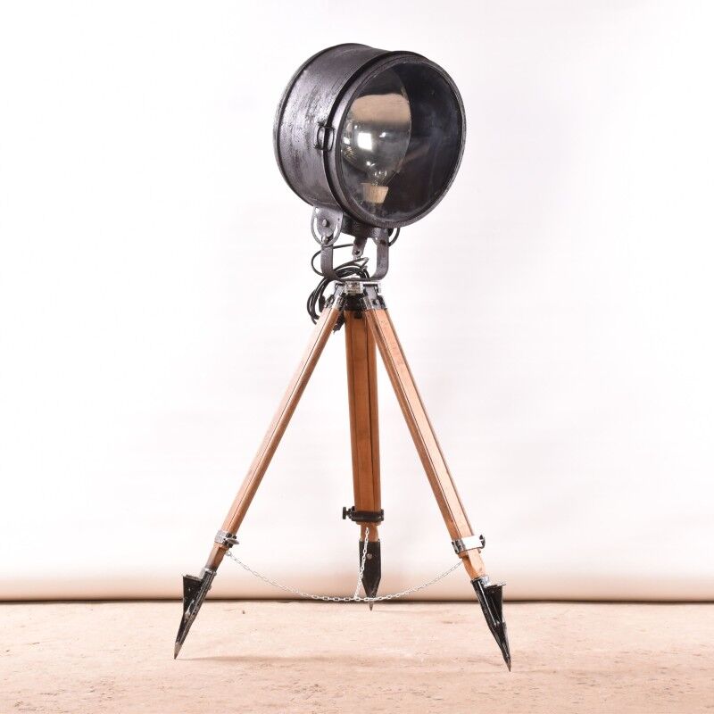 Ancien projecteur industriel sur trépied en bois