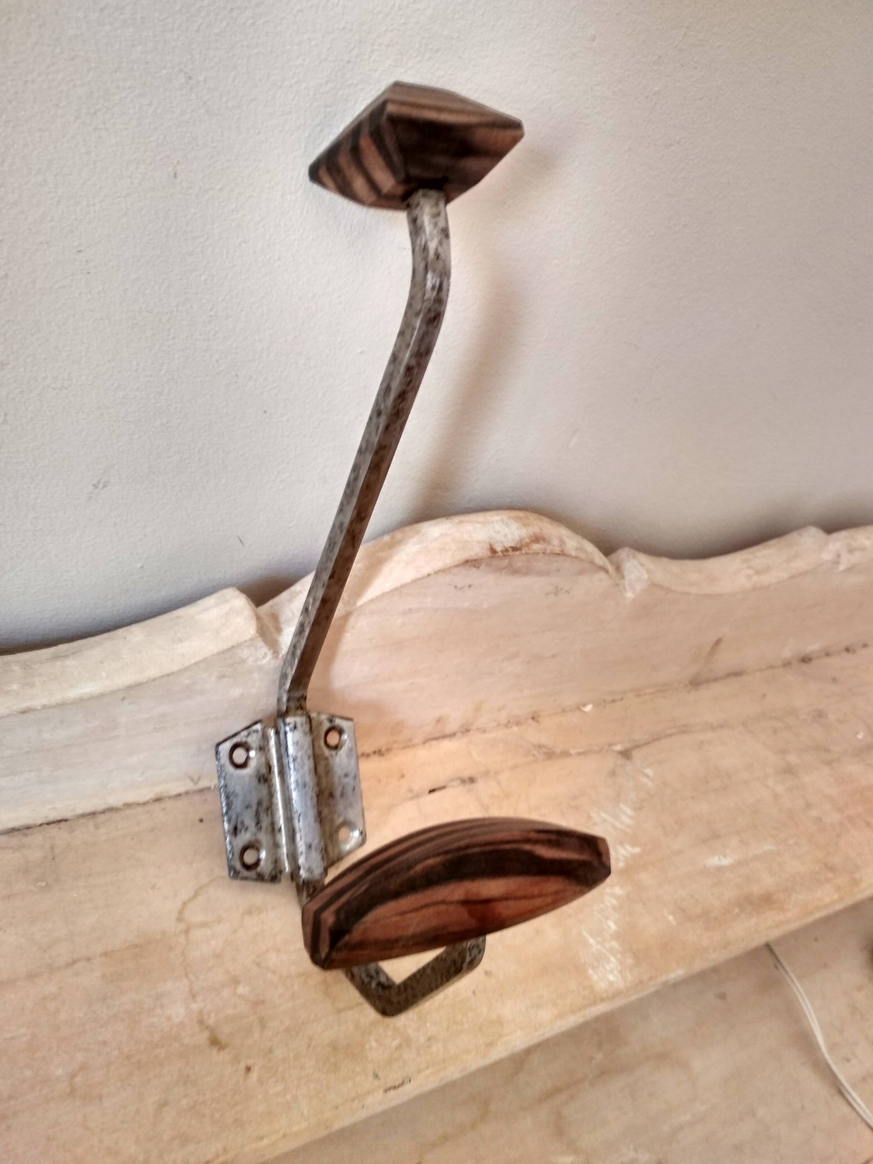 Old coat rack in metal and wood