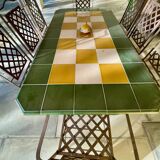 Dining table and seats for exterior or interior in metal and enameled lava tiles