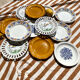 Set of twelve mismatched vintage dessert plates.